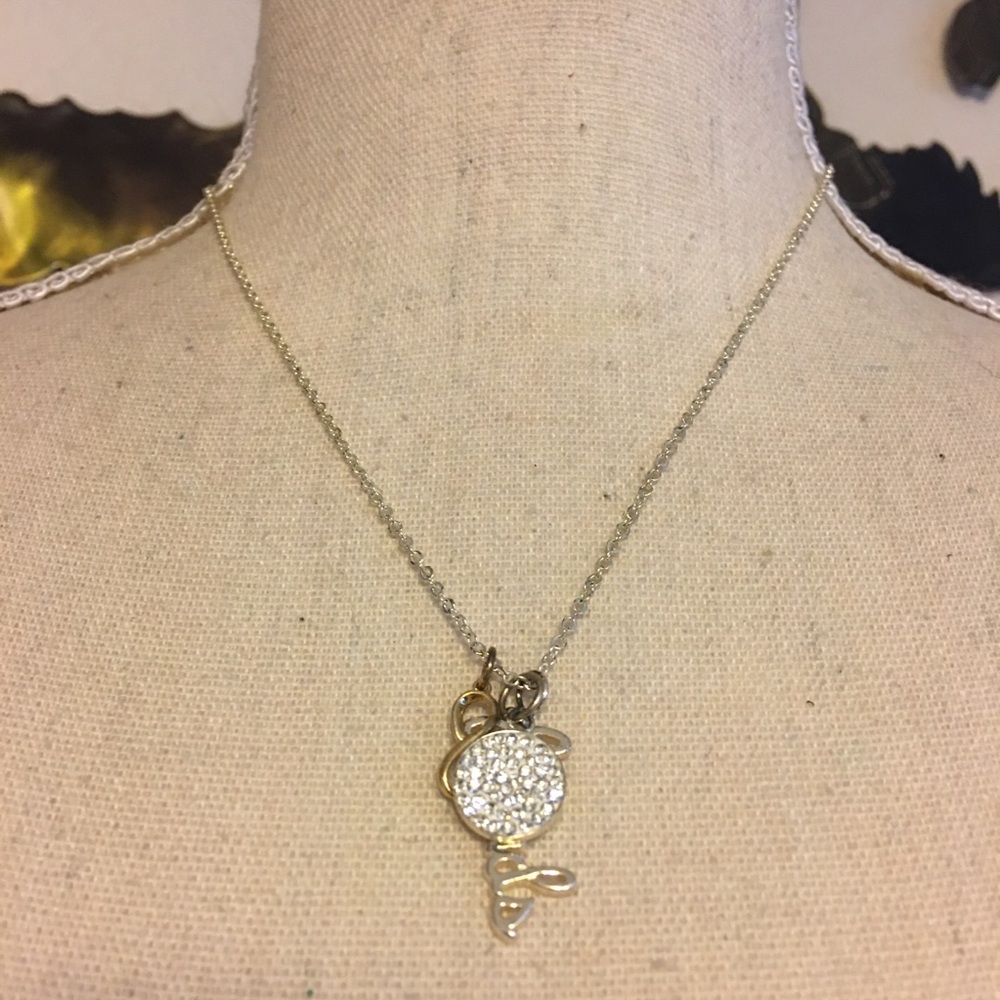 Gold and silver tone “friends” charm necklace